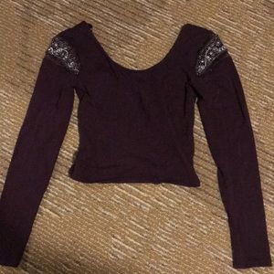 Long sleeve maroon crop top with low back